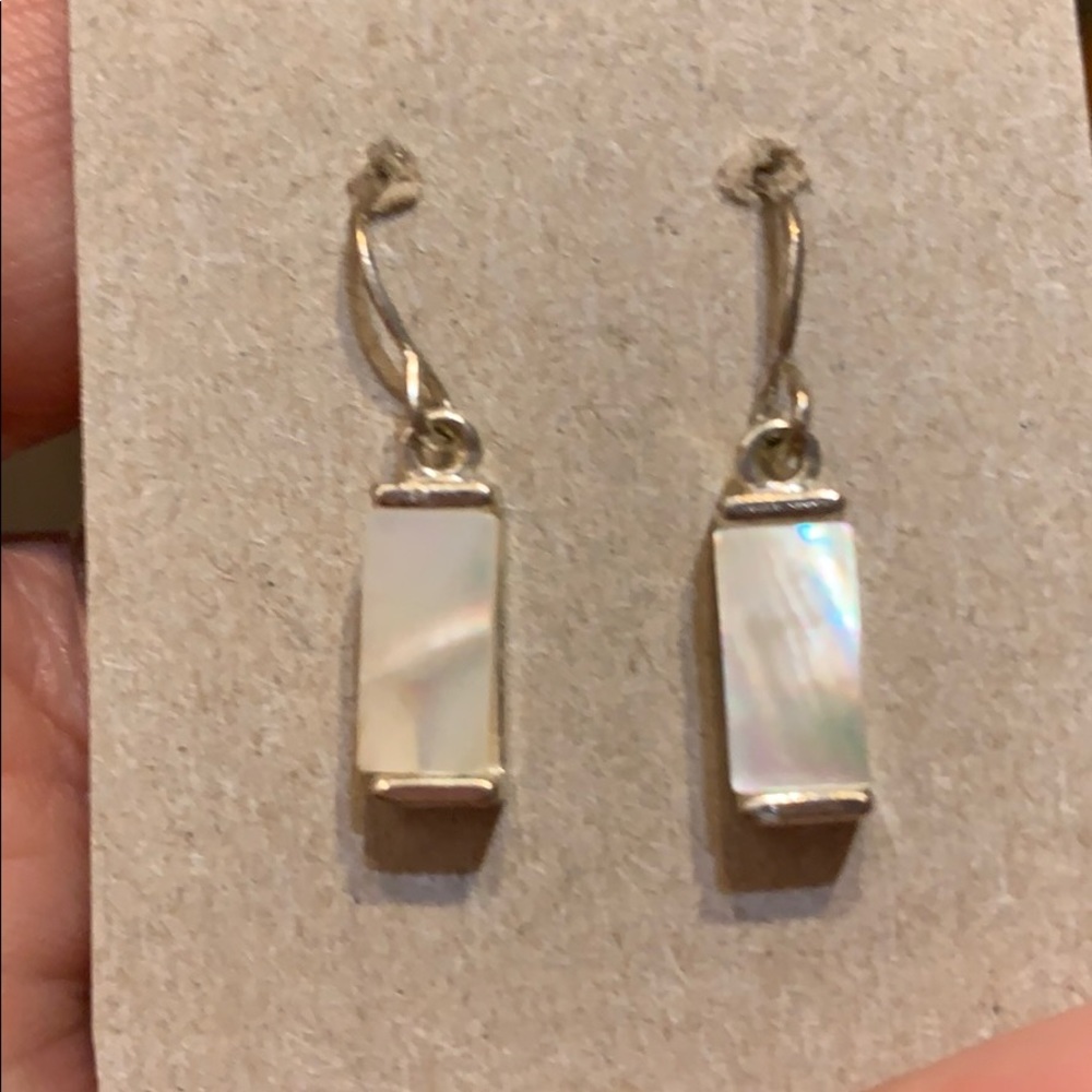Very pretty mother of pearl earrings. Never worn.